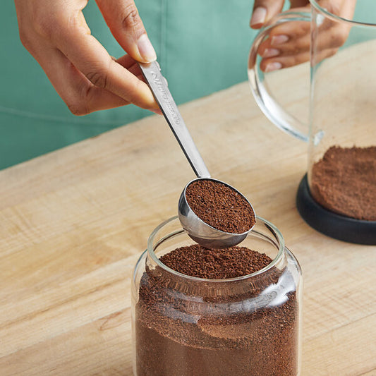 Measuring spoon with long handle